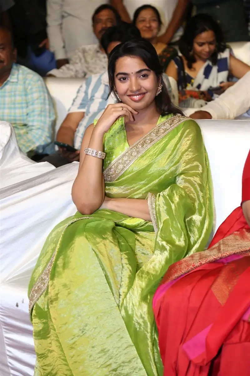 Shivathmika Rajashekar in Green Saree Sleeveless Blouse